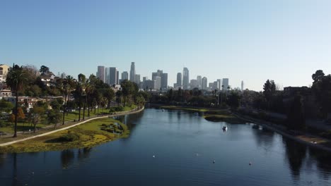 los angeles ca usa. aerial view of echo park lake and fountain, people and downtown in skyline, drone shot