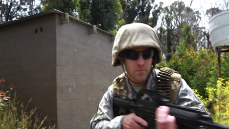 military soldier guarding with a rifle