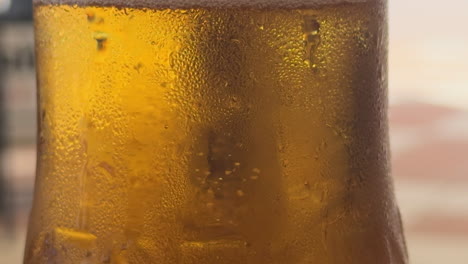 Close-view-of-a-cold-beer-with-bubbles-going-up