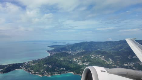 koh samui island airplane travel take-off landscape aerial view window plane holiday thailand