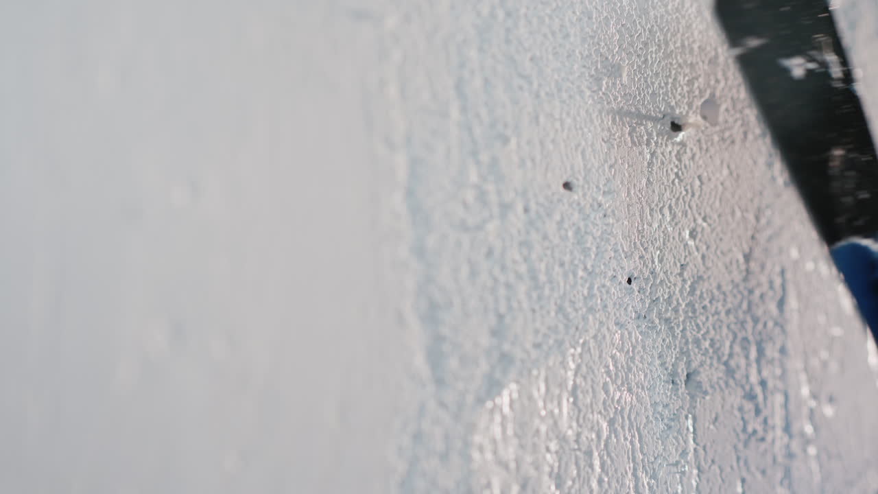 The Master Applies Putty On A White Wall