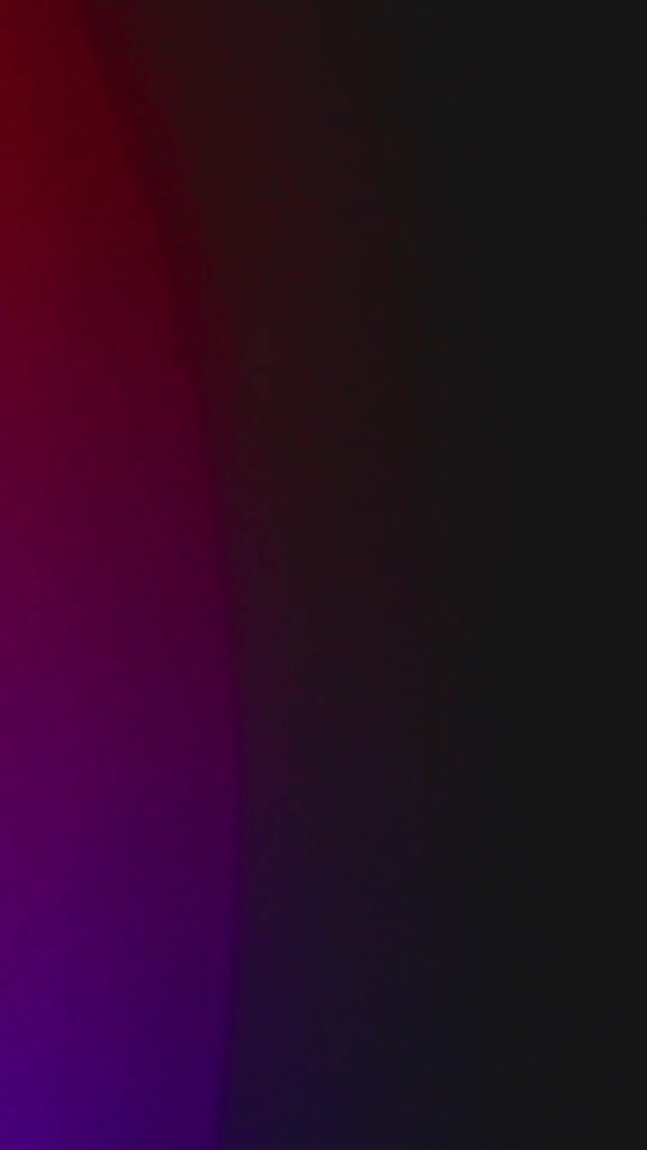 Abstract Dark Light Leaks and Color Transitions on Black Background