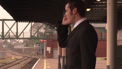 man waiting for train