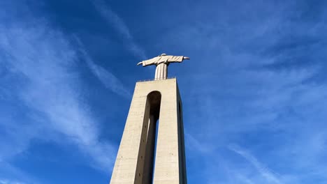 sanctuary of christ the king of portugal filmed from below with blue sky