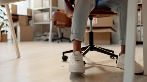 Anxiety,-work-and-tapping-feet-at-a-desk