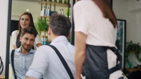 Handheld-view-of-handsome-man-having-visit-to-the-hairdresser