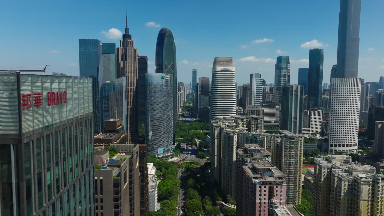 Skyscrapers and urban landscape of downtown Guangzhou with a bright, sunny sky