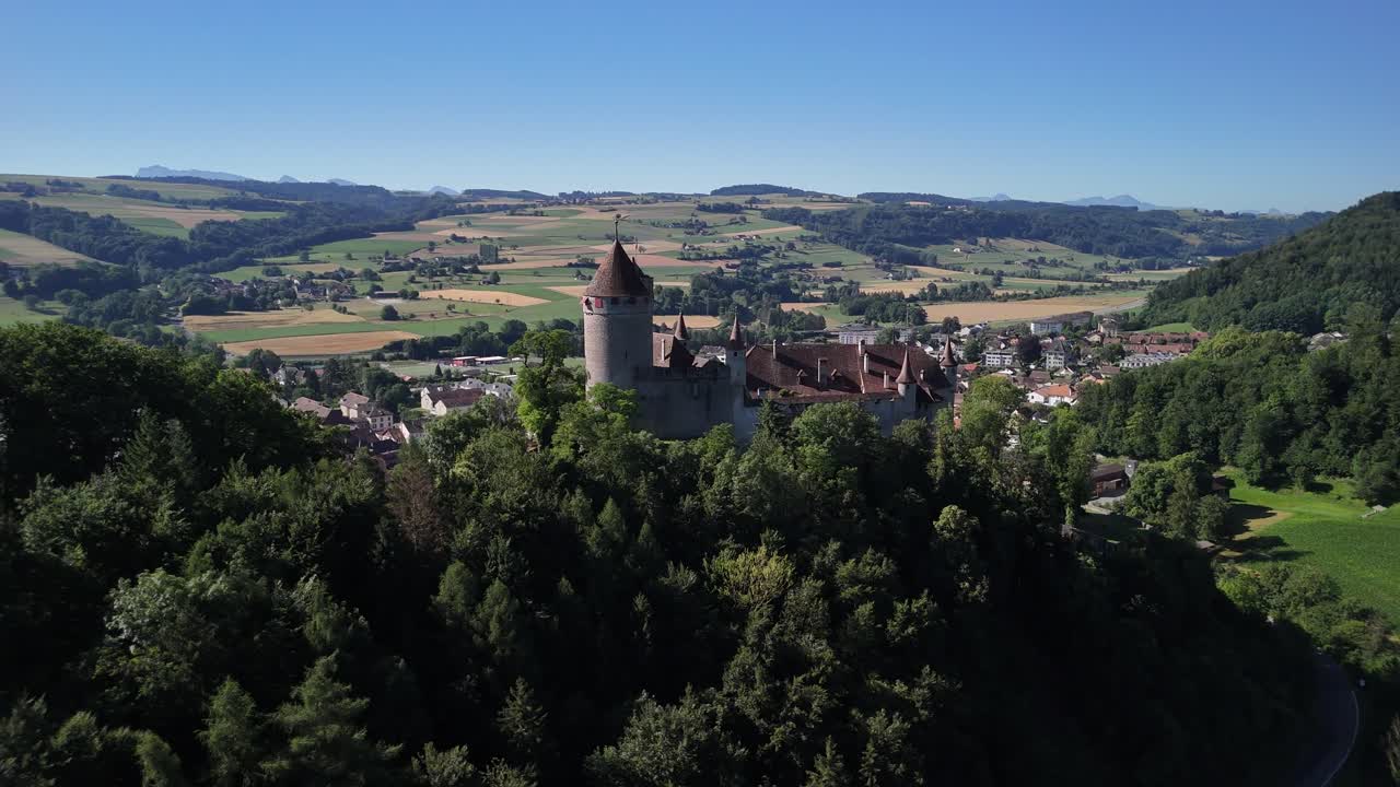 Medieval castle Lucens Switzerland Swiss architecture stone old building, aerial drone