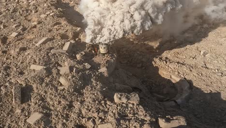 Smoke-bombs-on-the-ground,-visible-shadows-of-Israeli-IDF-soldiers