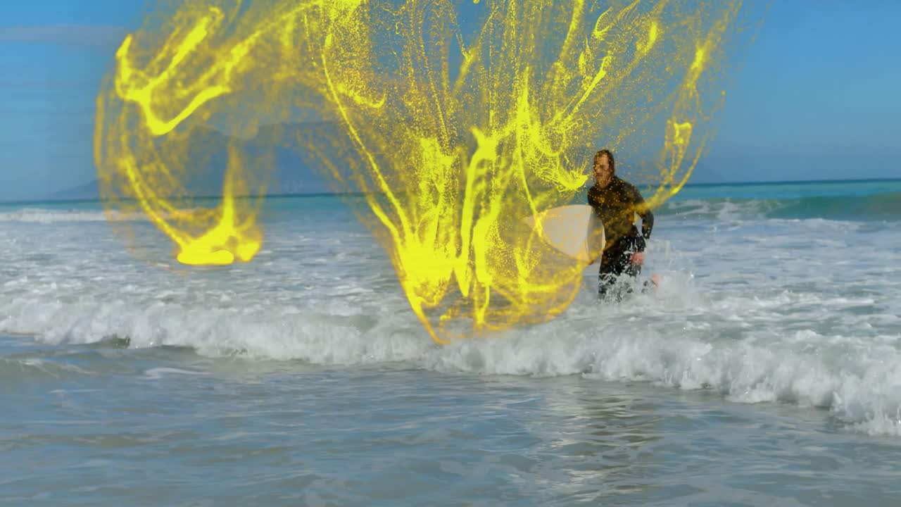 Surfer athlete sprinting on shoreline, showing tech graphic with black wetsuit and yellow particles