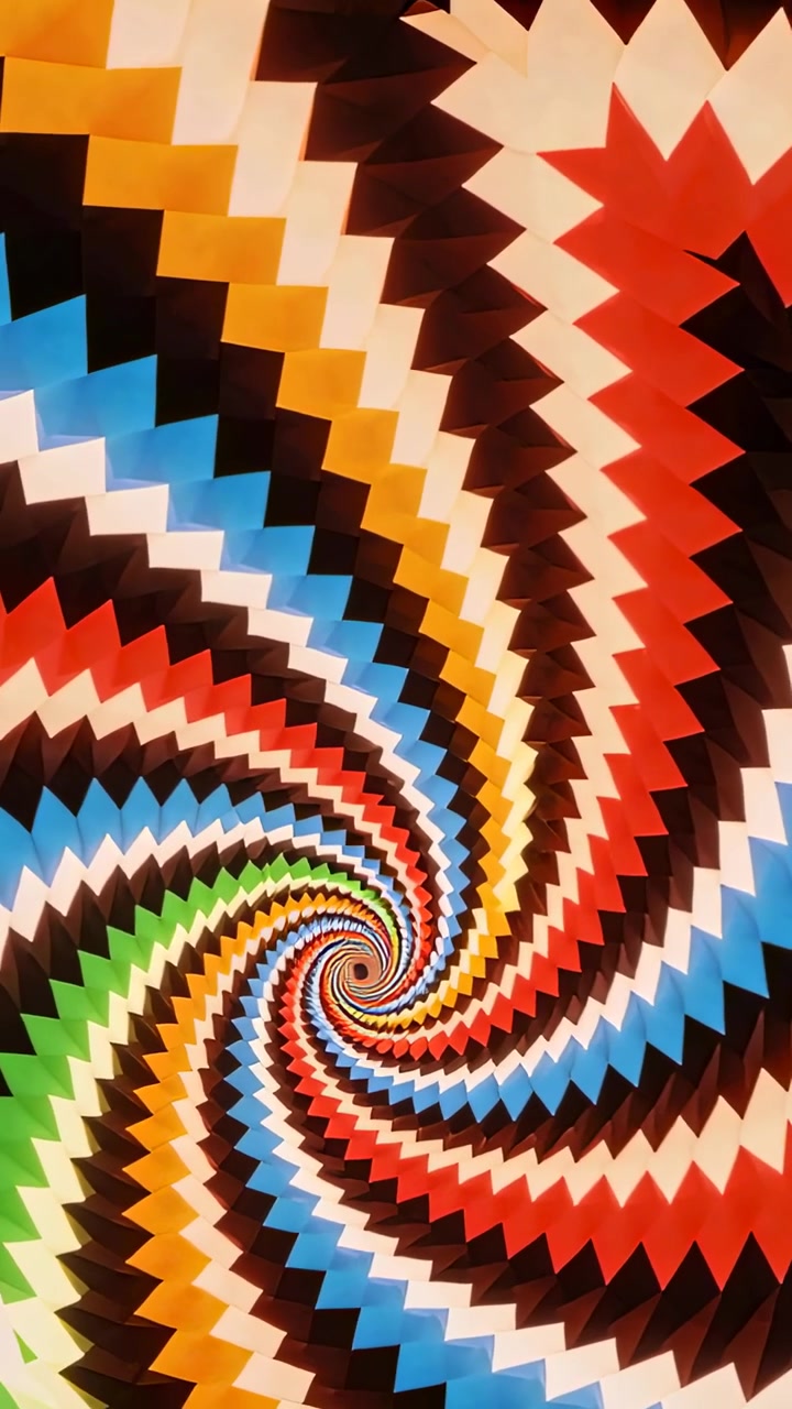 Video verticale: Fotogrammi in movimento che creano una spirale a chevron che ruota in un vortice, riempiendo l'inquadratura.