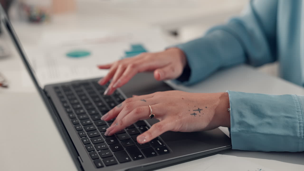 Typing on a Laptop for Business Analysis