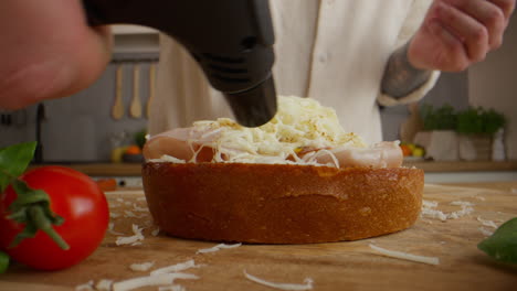 making a toasted ham and cheese sandwich