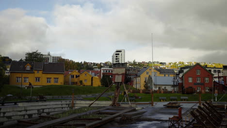 Old-Wooden-Buildings-At-Skansen-Near-Old-Shipyard-In-Tromso,-Norway