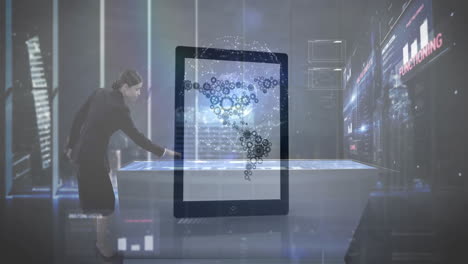 digital gears and world map animation over futuristic office setting with people