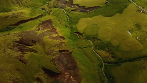 aerial landscape view of a river flowing in a mountain gorge, in iceland