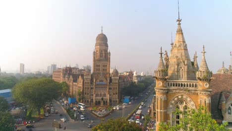 a drone shot of chhatrapati shivaji maharaj terminus and the municipal corporation of greater mumbai heritage buildings in the fort area of south bombay