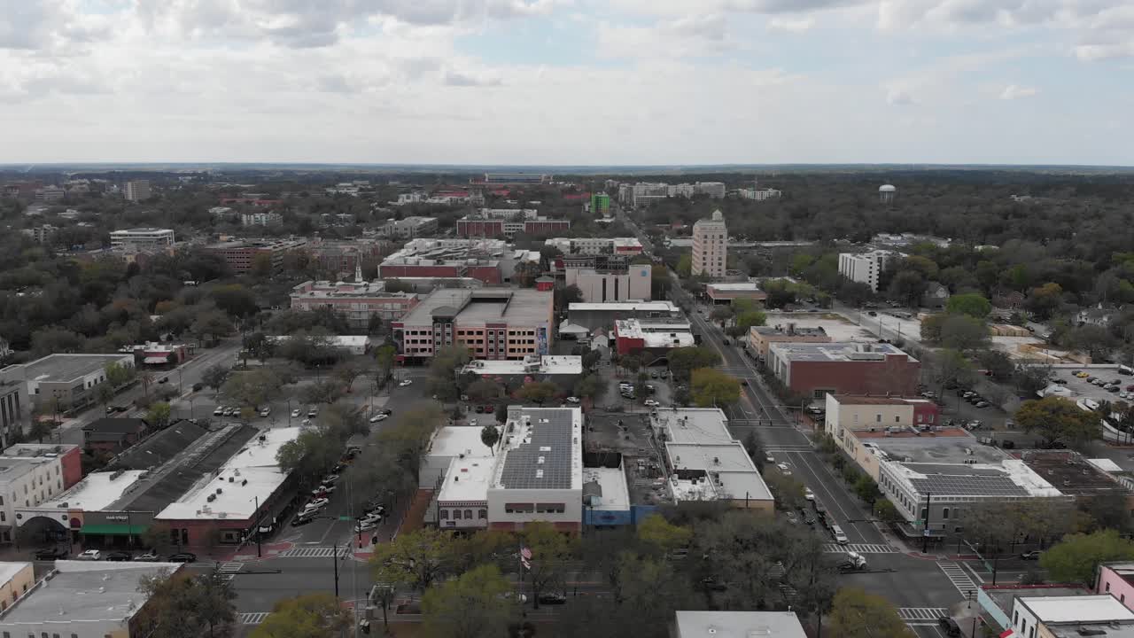 Aerial View of Downtown Gainesville Near University Ave With University of Florida in Distance