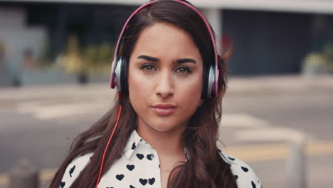 slow motion portrait of beautiful indian woman listening to music