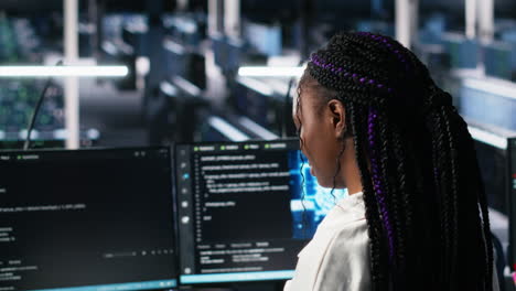 technicians in data center review ai diagnostics, analyzing neural networks