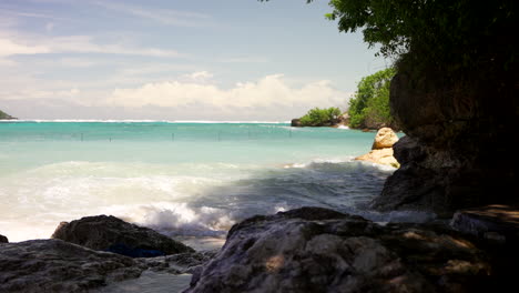 Waves-Coming-Onto-The-Tropical-Beach-In-Nusa-Lembongan-Island-in-Indonesia