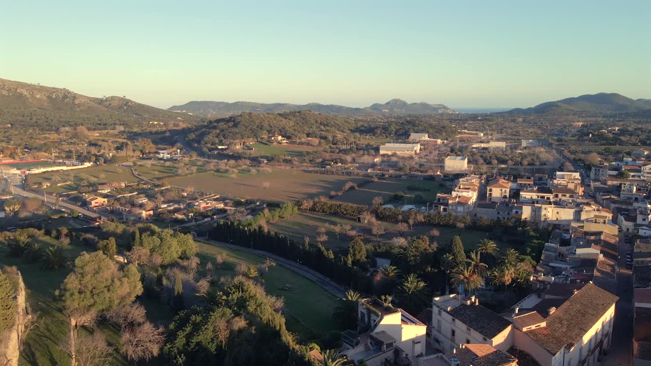 Explore the charming town of Arta in Mallorca as the sun sets, revealing breathtaking landscapes and historic architecture.