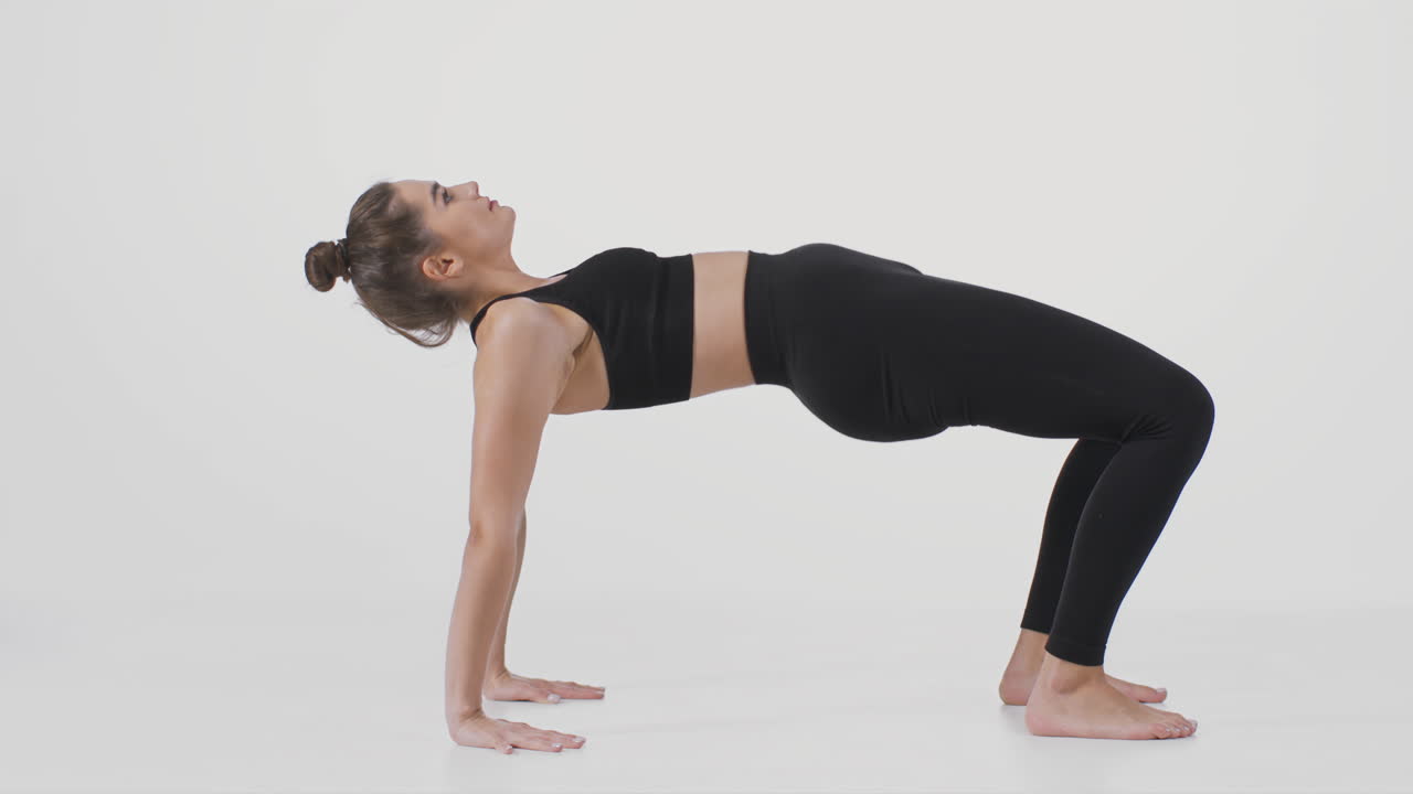 Woman performing yoga poses