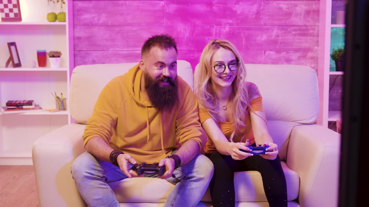 Couple playing video games together