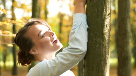 beauty romantic girl outdoors enjoying nature. portrait of young fashion woman outdoor on autumn background