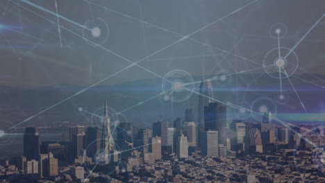 animation of connected dots over aerial view of cityscape with skyscrapers against sea and sky