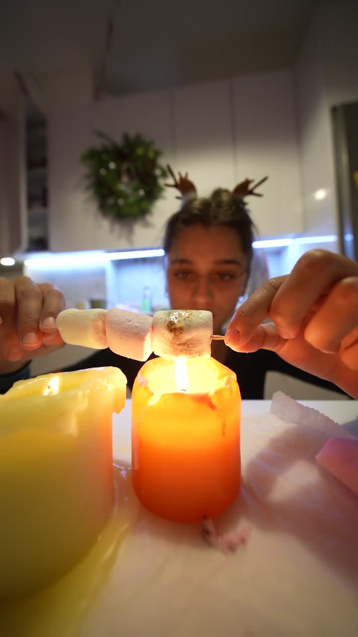 Woman Roasting Marshmallows with Candles