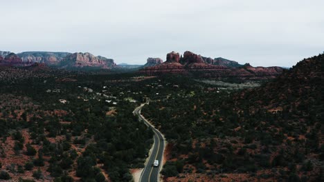 White-RV-driving-through-the-Arizona-dessert