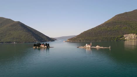 Our-Lady-of-the-Rocks-and-Gospa-od-Skrpjela-islets,-paradisiac-and-peaceful-Bay-of-Kotor,-Montenegro