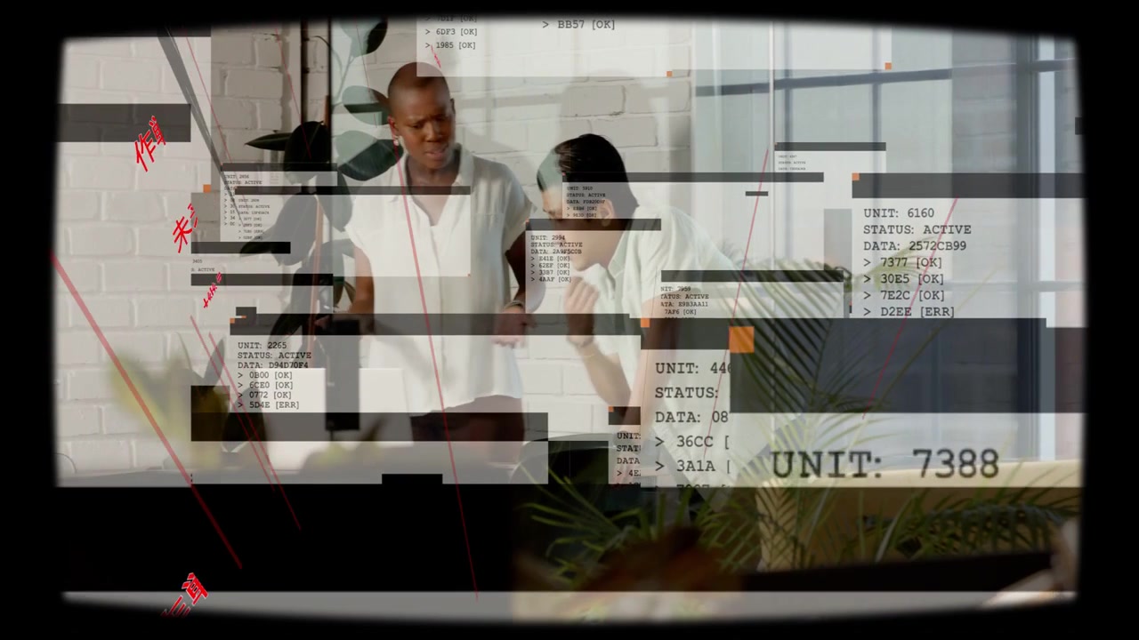 Two men leaning over office laptop while tech feed initiating overlaying UI, team reviewing data
