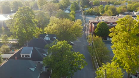 aerial above street in residential town in usa