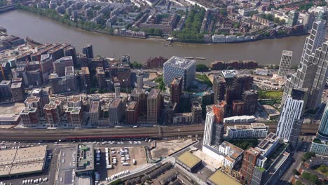 aerial view of the us embassy, nine elms, vauxhall west, vauxhall station, river thames and the mi-6 building, london, uk.