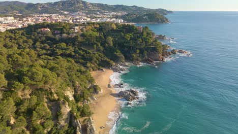 mediterranean beach paradisiaca turquoise blue waters no people aerial view drone spain catalunya costa brava blanes lloret de mar mallorca balearic islands