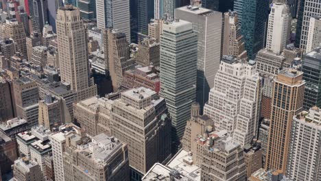 slow motion landscape of city skyscrapers towers buildings urban cbd skyline of manhattan new york usa america architecture infrastructure design commercial empire state