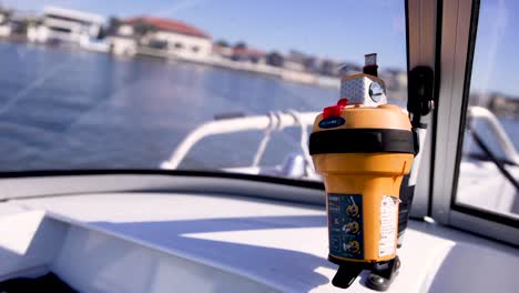 signal device on boat with waterfront view