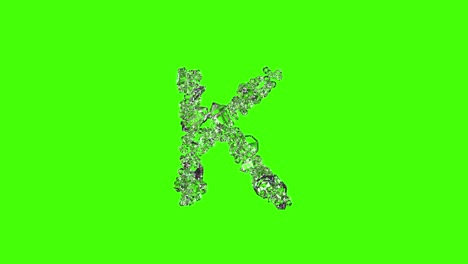 transparent brilliants crystal font - letter k on green screen, isolated - loop video