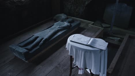 shot of a gravestone marking the resting place of an ancient, scottish-clan leader, famous as a warrior