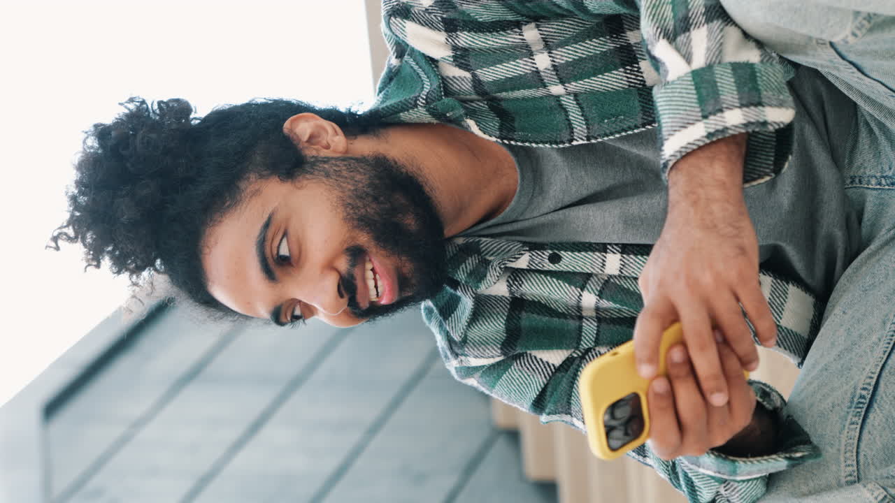 Young man using a smartphone outdoors