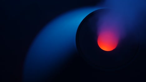 working a humidifier with a red circular light in the middle
