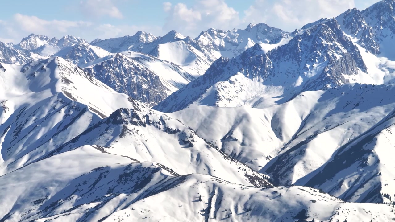 Drone high attitude panoramic view of Terskey Ala-Too mountain range, Kyrgyzstan. Winter landscape