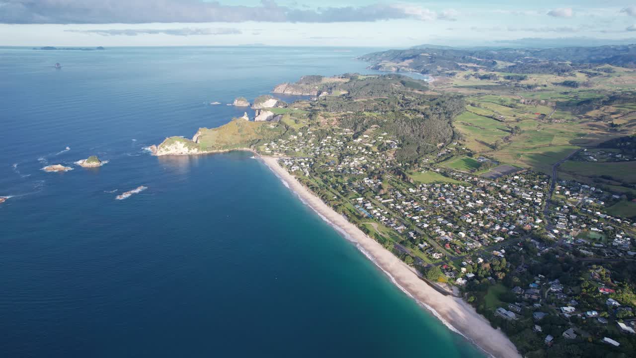 Aerial View of a Coastal Town and Beach