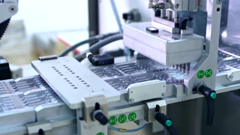 pharmaceutical production machine. medical ampoules on packaging line