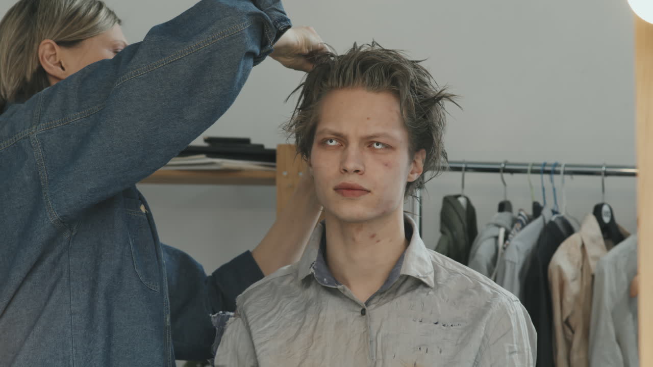 Female Hairstylist Working with Horror Movie Actor