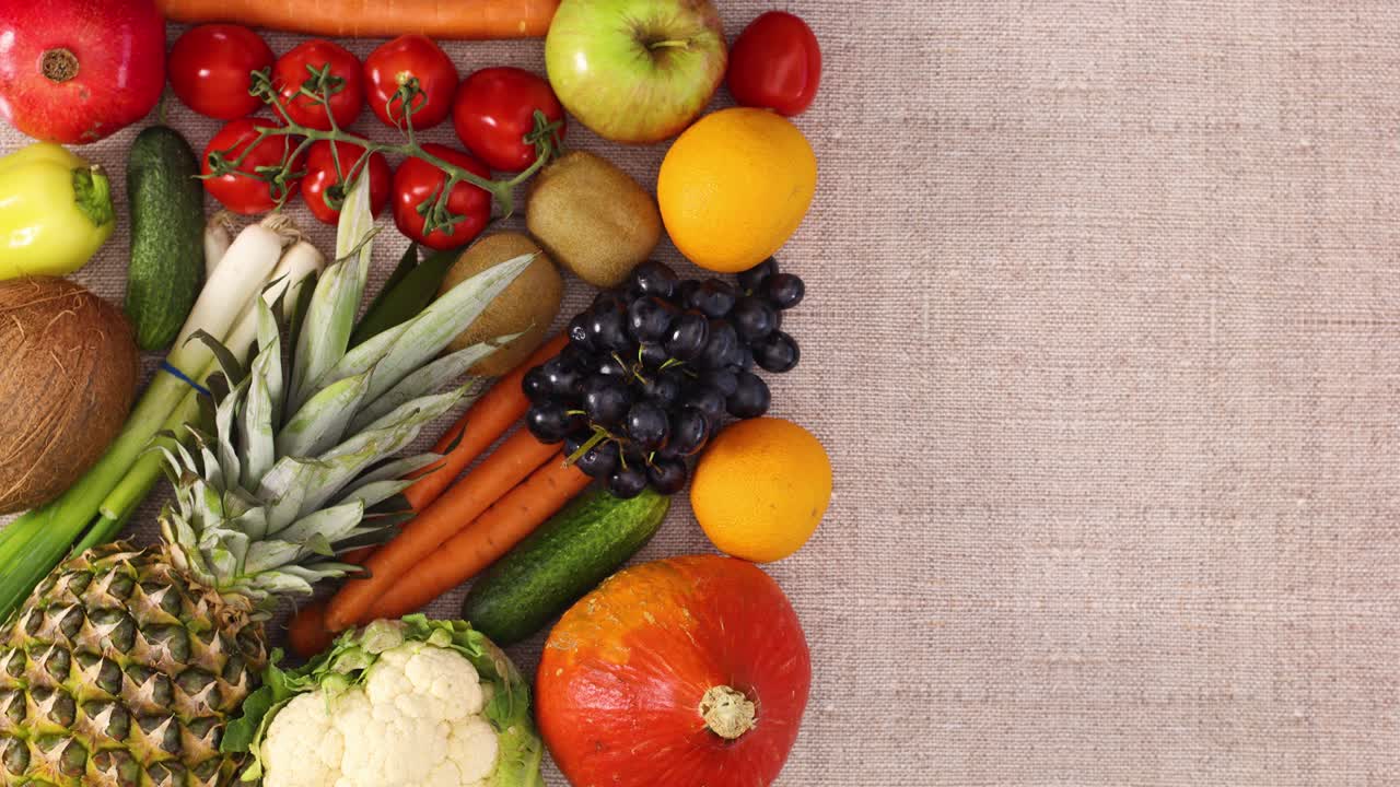 Empty frame for text appear on right side next to fruits and vegetables. Stop motion