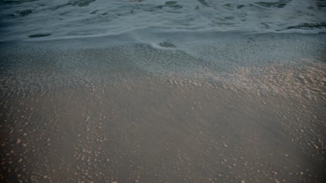 Breakwater-waves-at-Sunset-in-Gulf-Shores,-Alabama