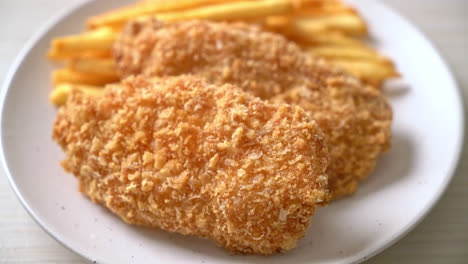 fried chicken breast fillet steak with french fries and ketchup